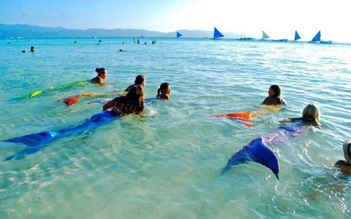Swimming school teaches you how to become a mermaid--top emoticon
